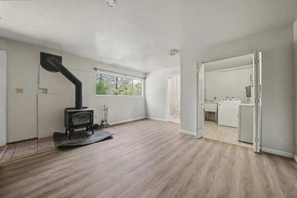 a view of livingroom with furniture and stairs