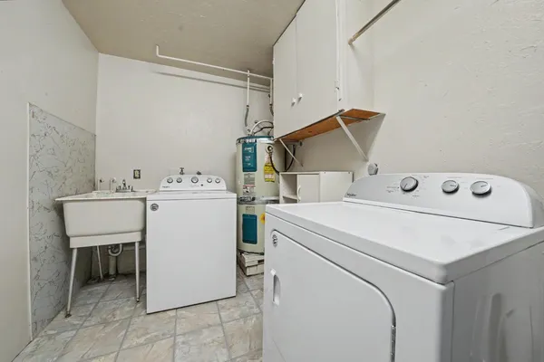 a view of a house with a small yard