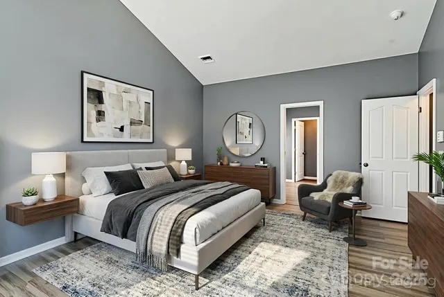 a bathroom with a toilet a sink and a mirror