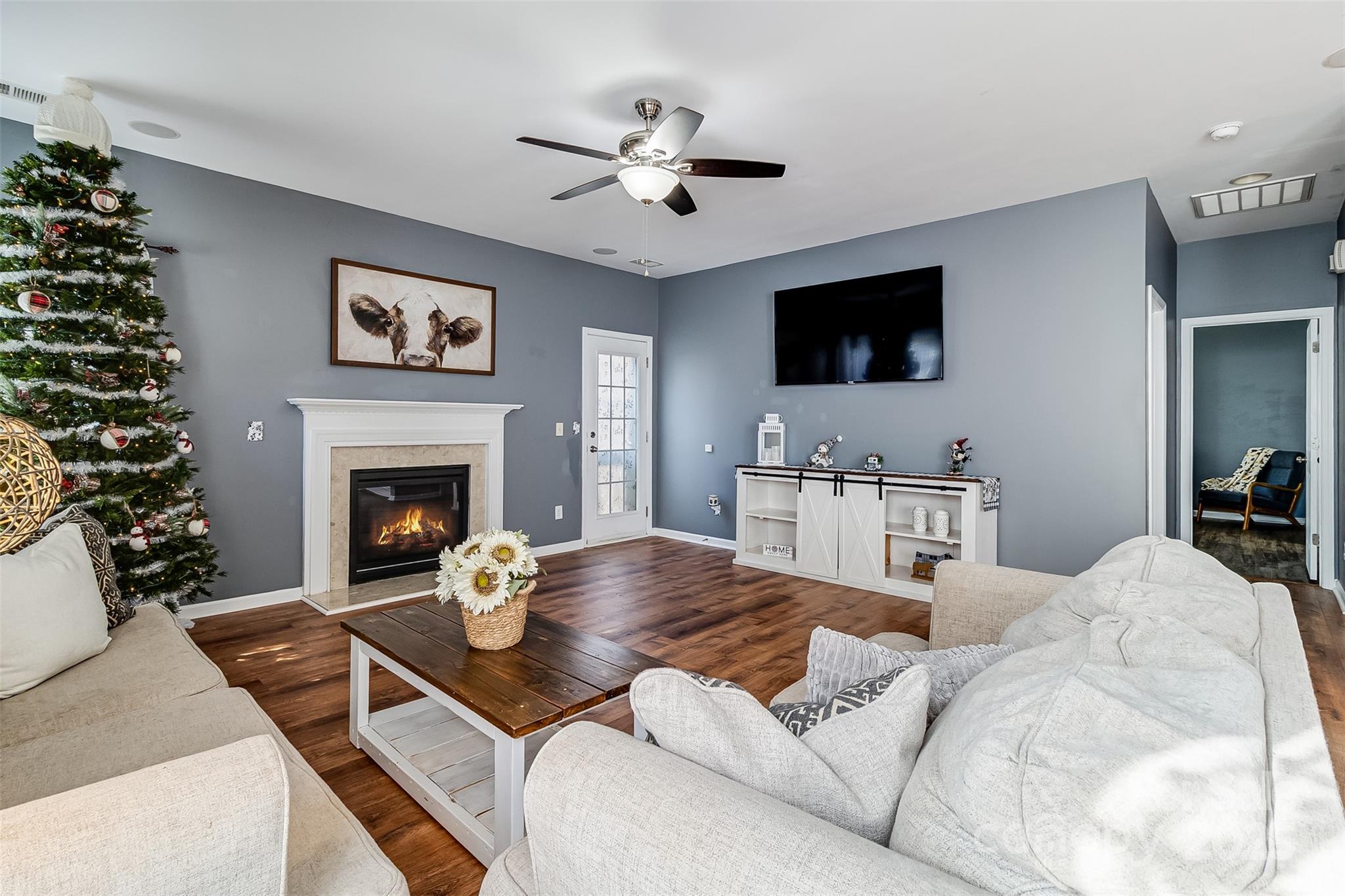 224 Morning Dew Lane Mount Holly, NC 28120 - Photo 15 of 48 a living room with furniture and a fireplace