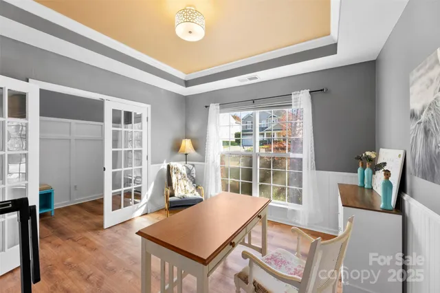 a view of a living room and dining room