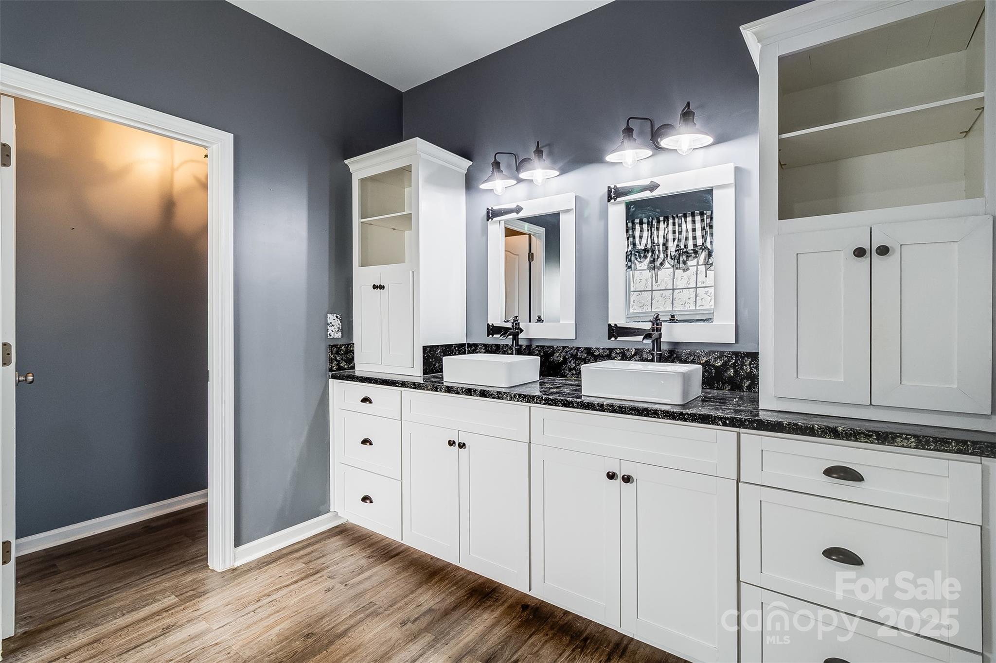 224 Morning Dew Lane Mount Holly, NC 28120 - Photo 21 of 48 a bathroom with a double vanity sink and a mirror