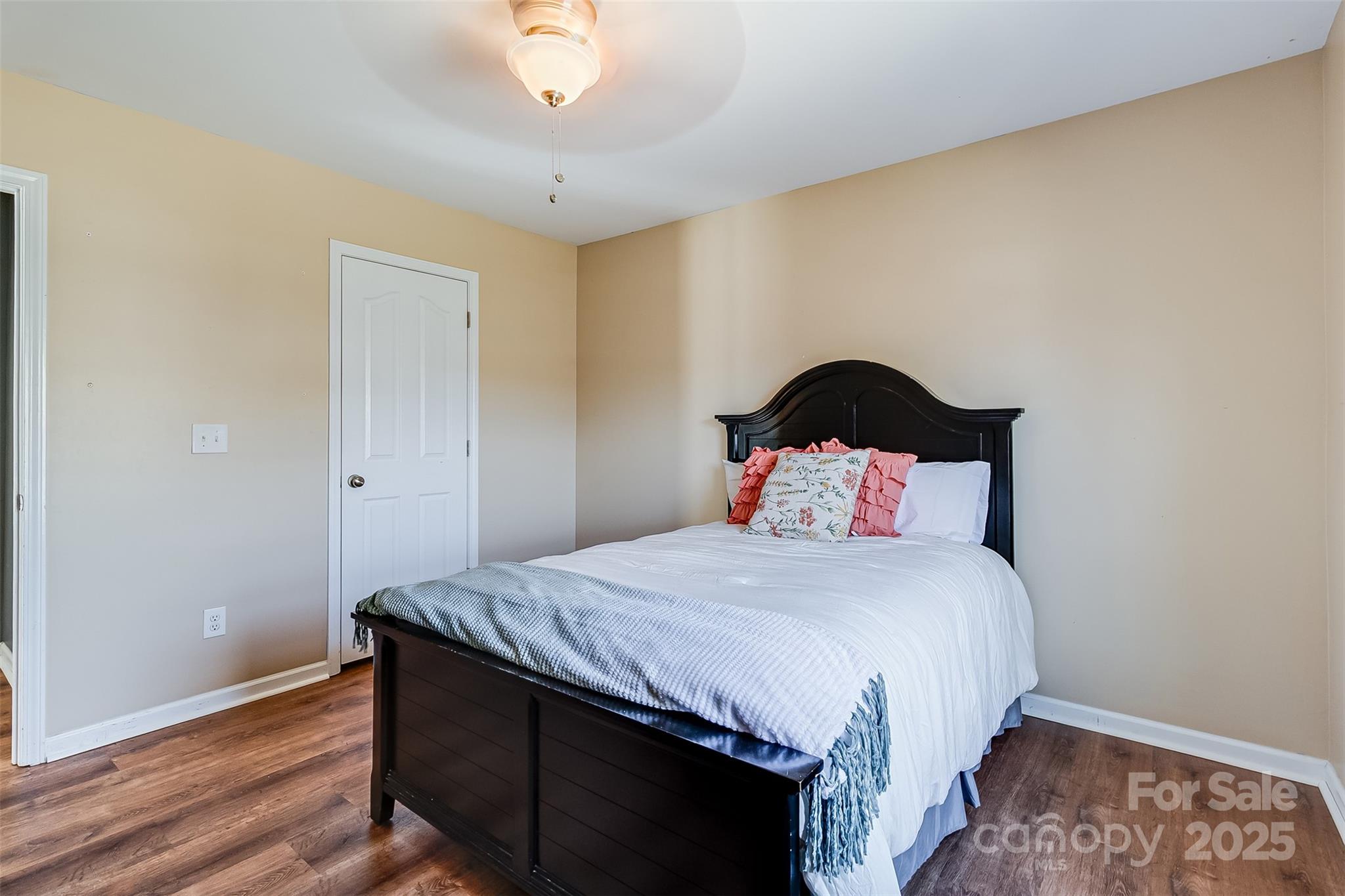 224 Morning Dew Lane Mount Holly, NC 28120 - Photo 27 of 48 a bedroom with a bed and wooden floor