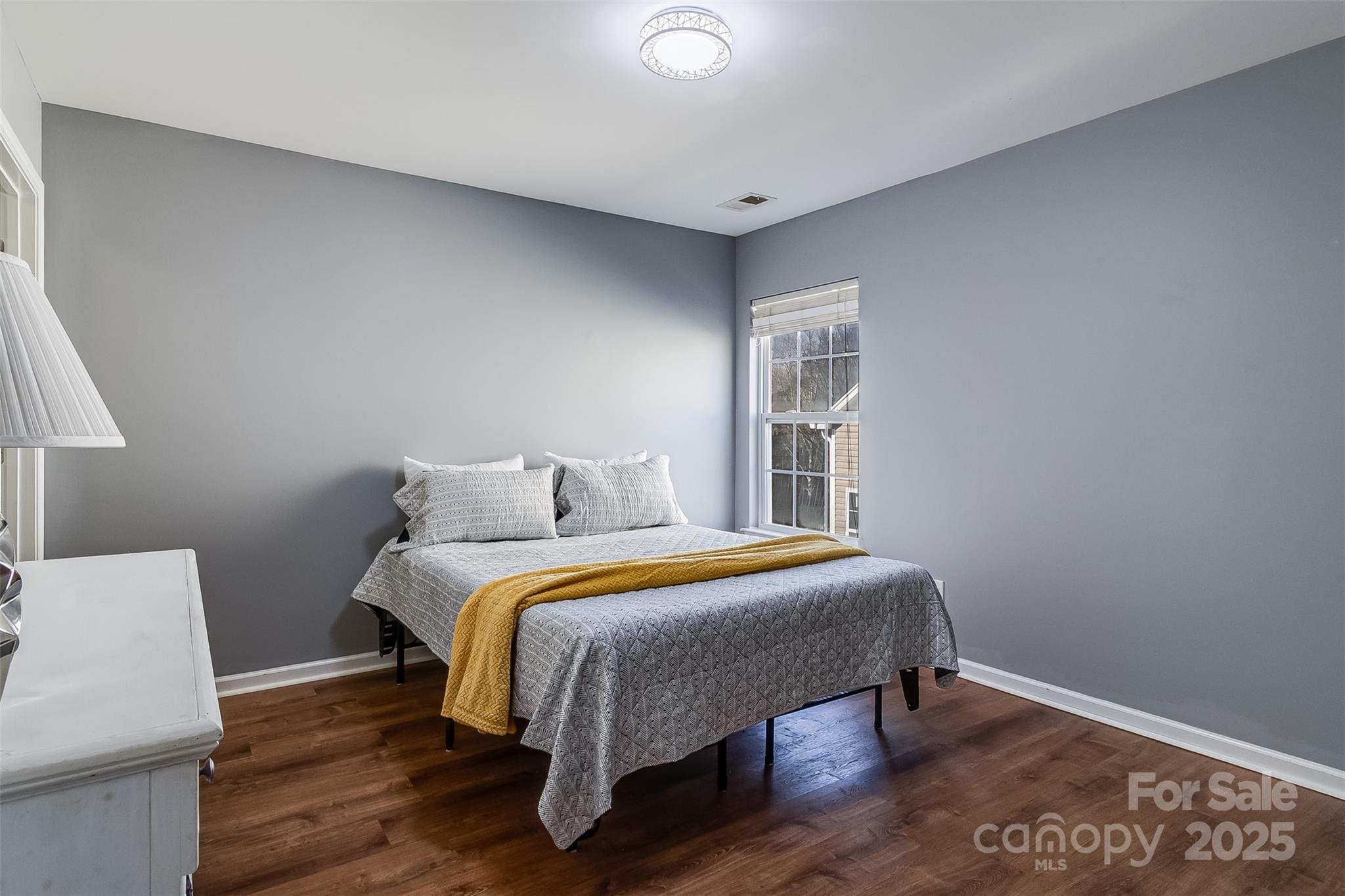224 Morning Dew Lane Mount Holly, NC 28120 - Photo 28 of 48 a bedroom with a bed and a window