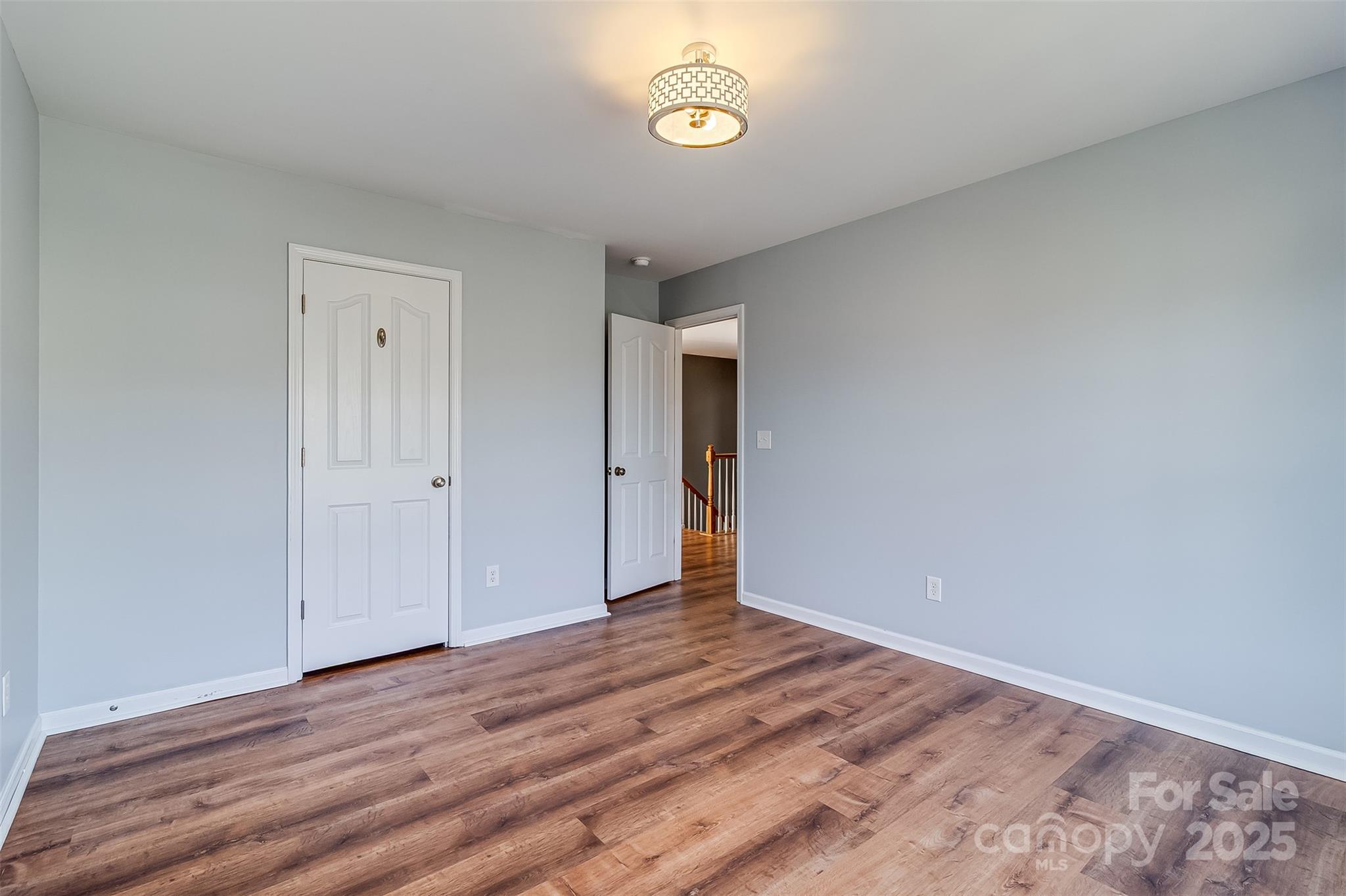 224 Morning Dew Lane Mount Holly, NC 28120 - Photo 35 of 48 a view of a room with wooden floor