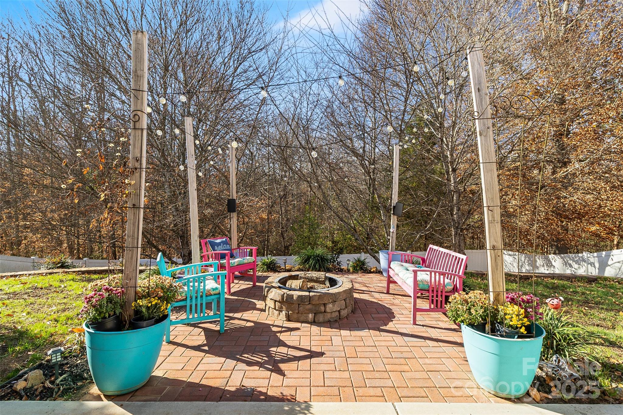 224 Morning Dew Lane Mount Holly, NC 28120 - Photo 5 of 48 a view of a tables and chairs in patio with a potted plant