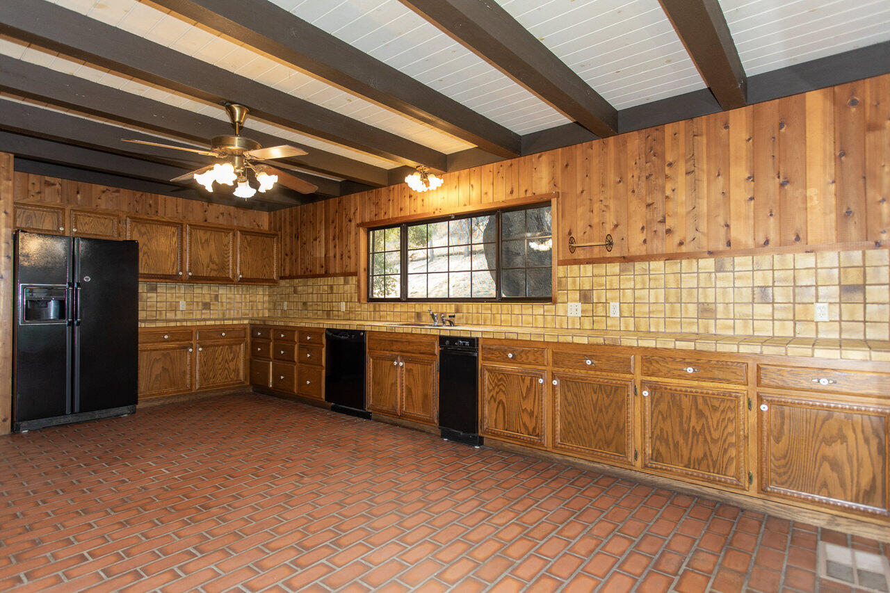 4260 Oak View Road Santa Ynez, CA 93460 - Photo 12 of 98 a kitchen with granite countertop a sink stainless steel appliances and cabinets