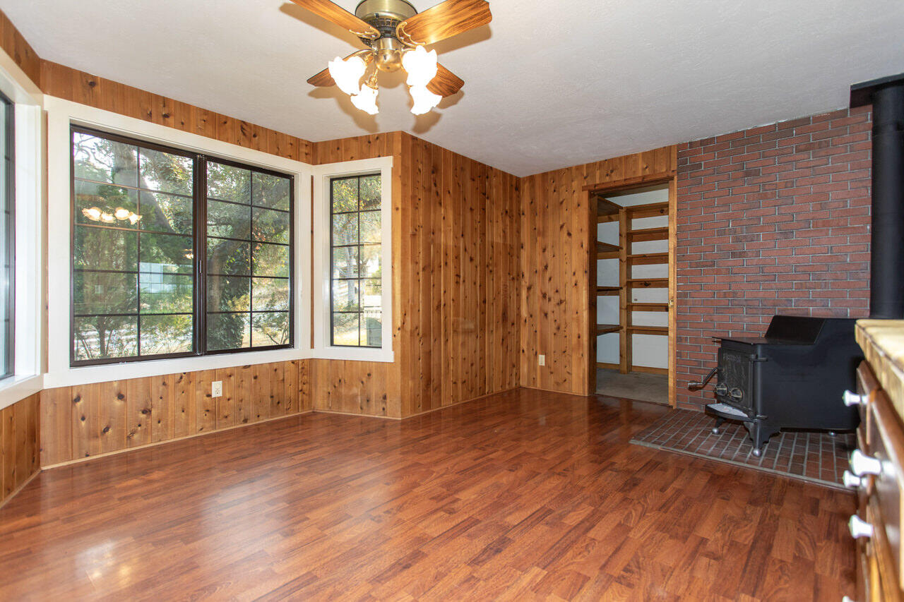 4260 Oak View Road Santa Ynez, CA 93460 - Photo 16 of 98 a view of an empty room with a window and wooden floor
