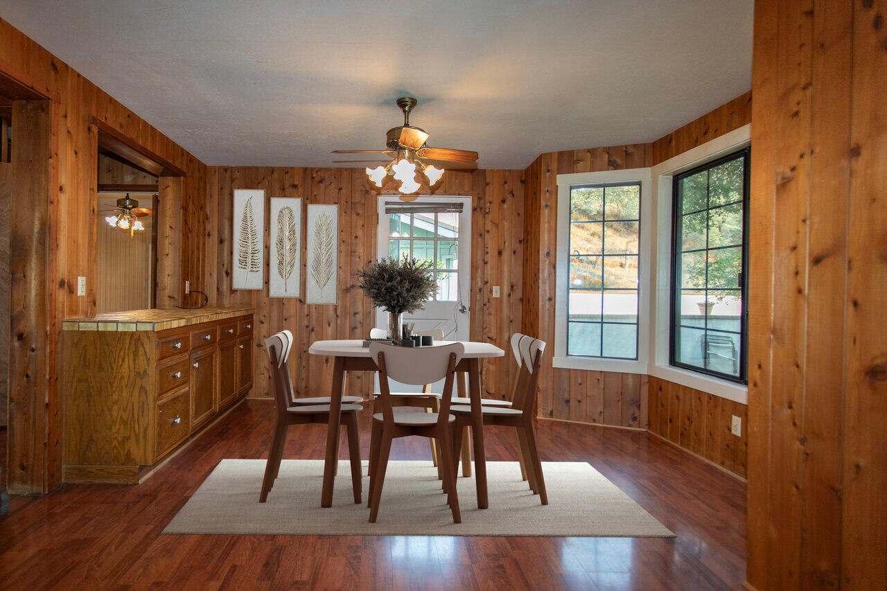 4260 Oak View Road Santa Ynez, CA 93460 - Photo 17 of 98 a view of a dining room with furniture window and wooden floor