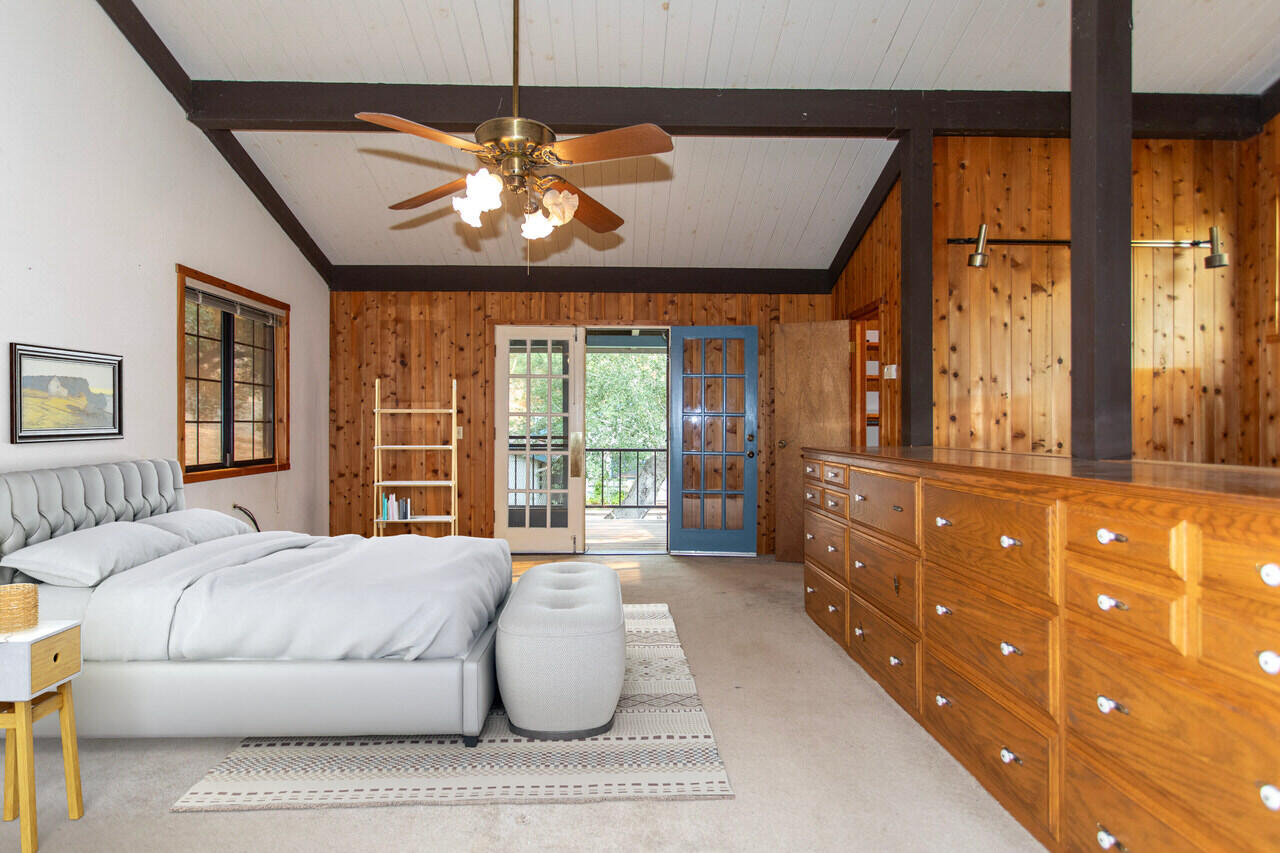 4260 Oak View Road Santa Ynez, CA 93460 - Photo 21 of 98 a spacious bedroom with a large bed and a large window