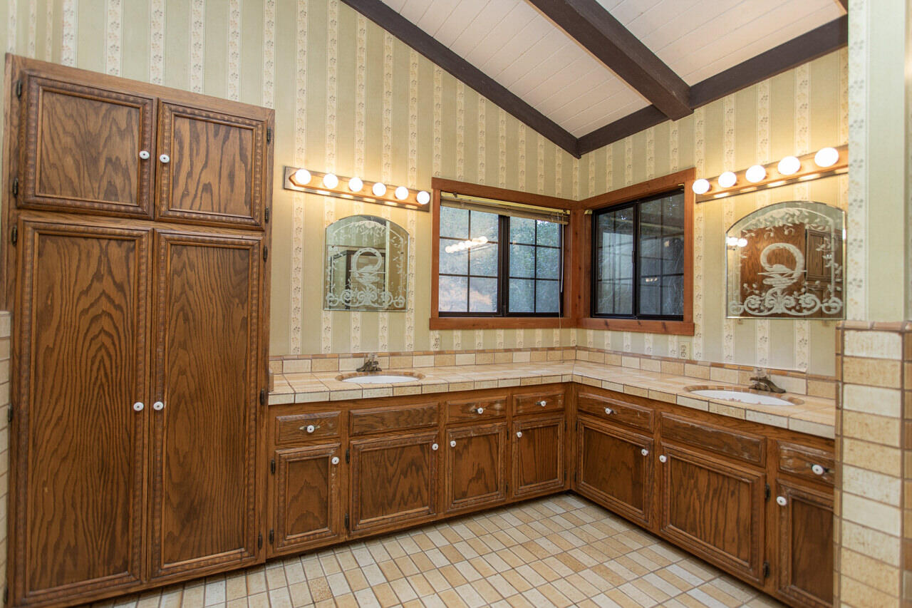 4260 Oak View Road Santa Ynez, CA 93460 - Photo 31 of 98 a kitchen with stainless steel appliances granite countertop a sink and cabinets