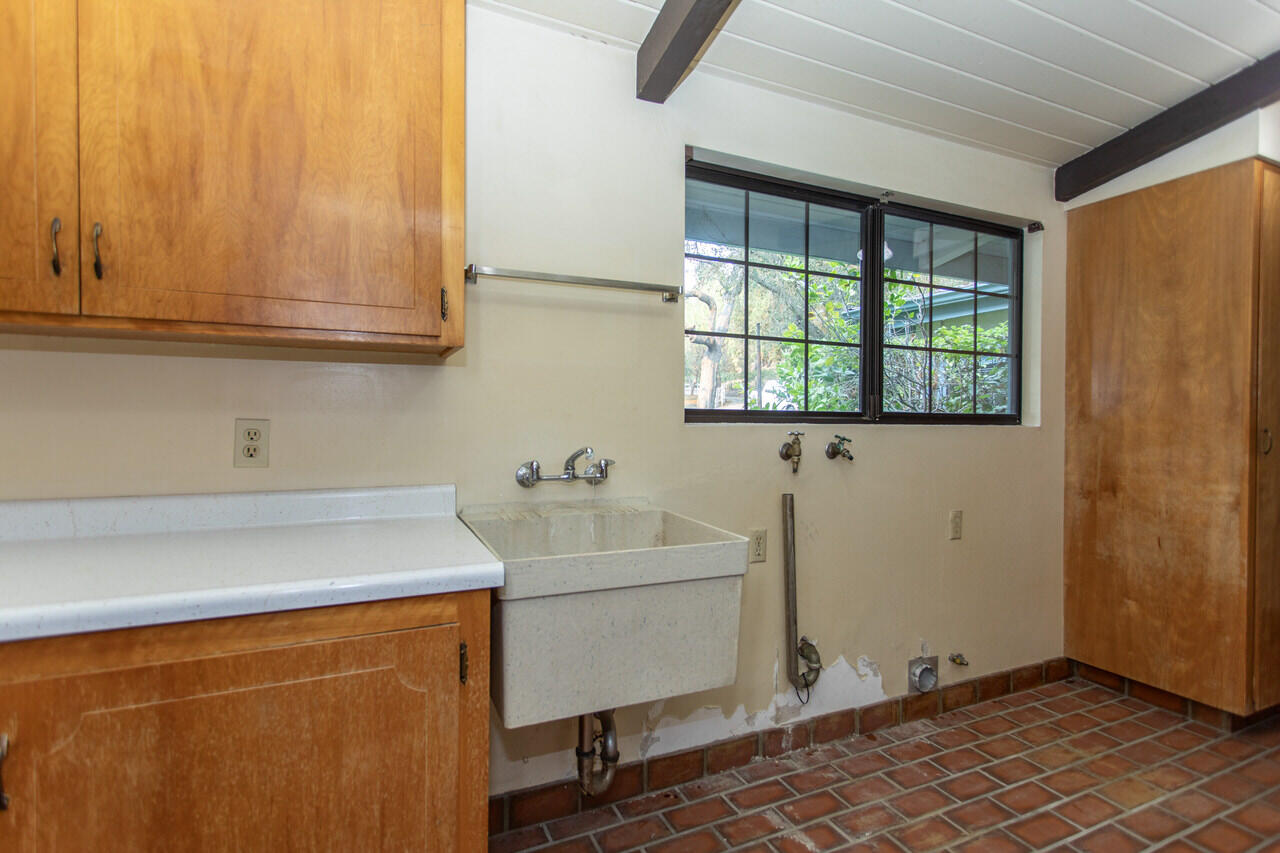 4260 Oak View Road Santa Ynez, CA 93460 - Photo 32 of 98 a bathroom with a sink and a window