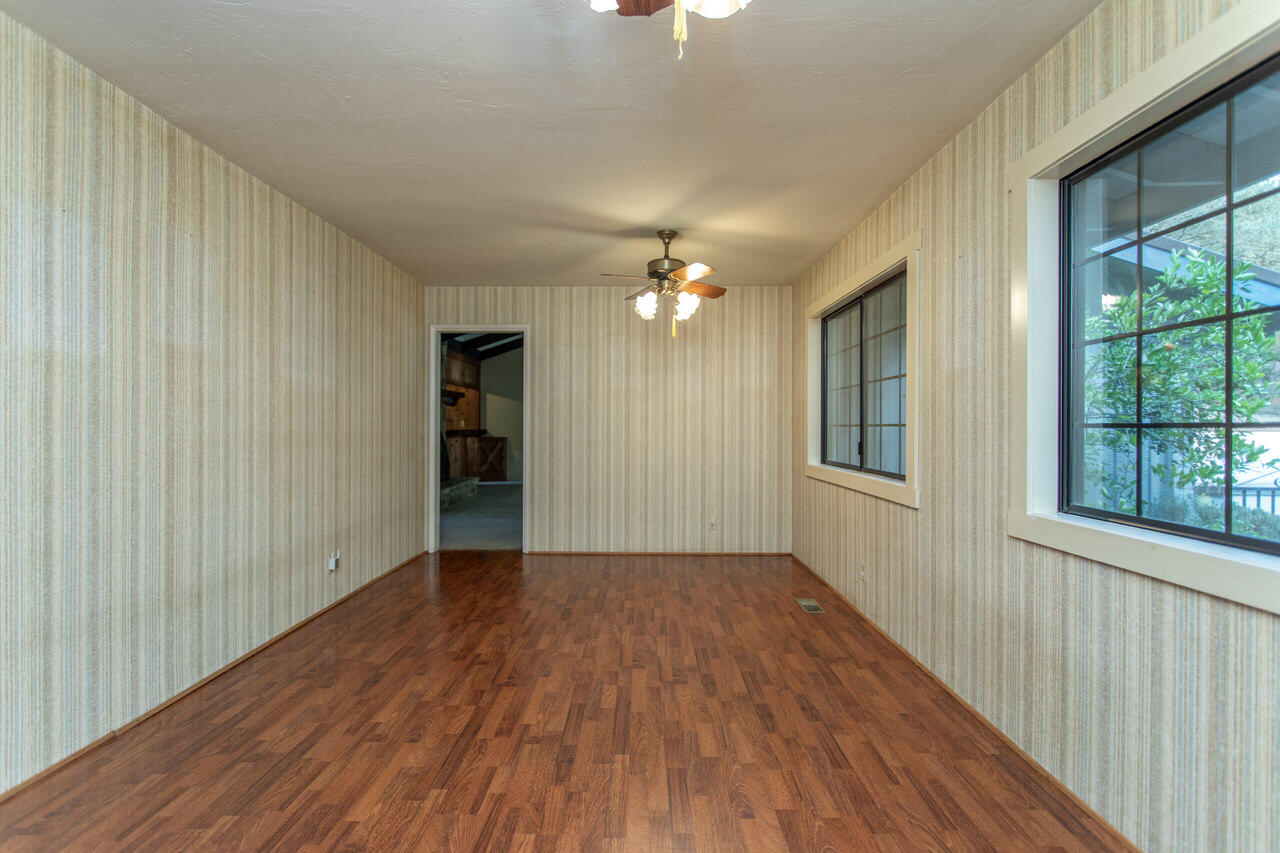 4260 Oak View Road Santa Ynez, CA 93460 - Photo 34 of 98 a view of a livingroom with wooden floor and a large window