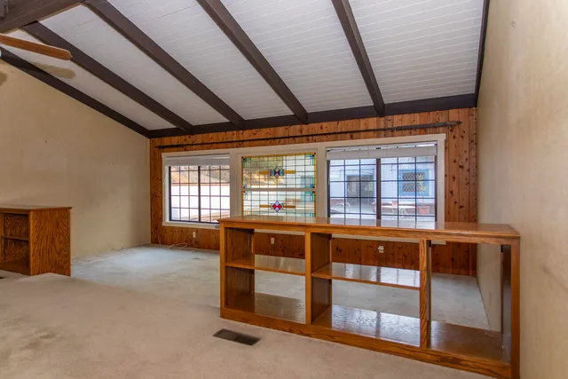 a bathroom with a toilet a sink and a mirror