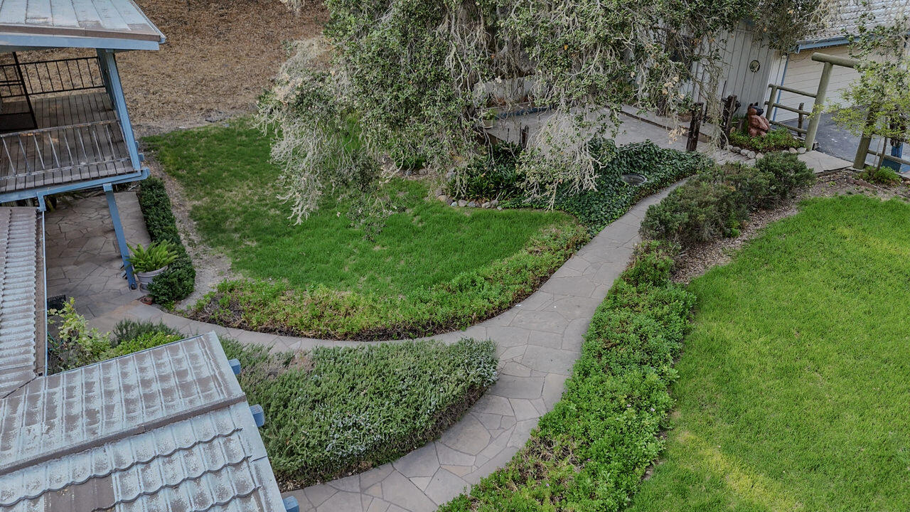 4260 Oak View Road Santa Ynez, CA 93460 - Photo 4 of 98 a view of a garden with a pathway