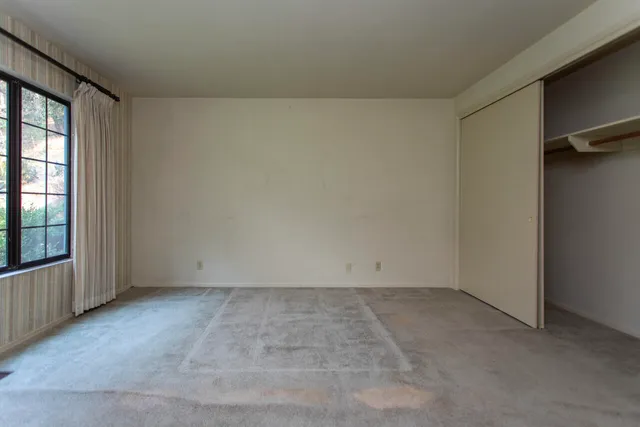 a kitchen with a stove top oven sink and cabinets