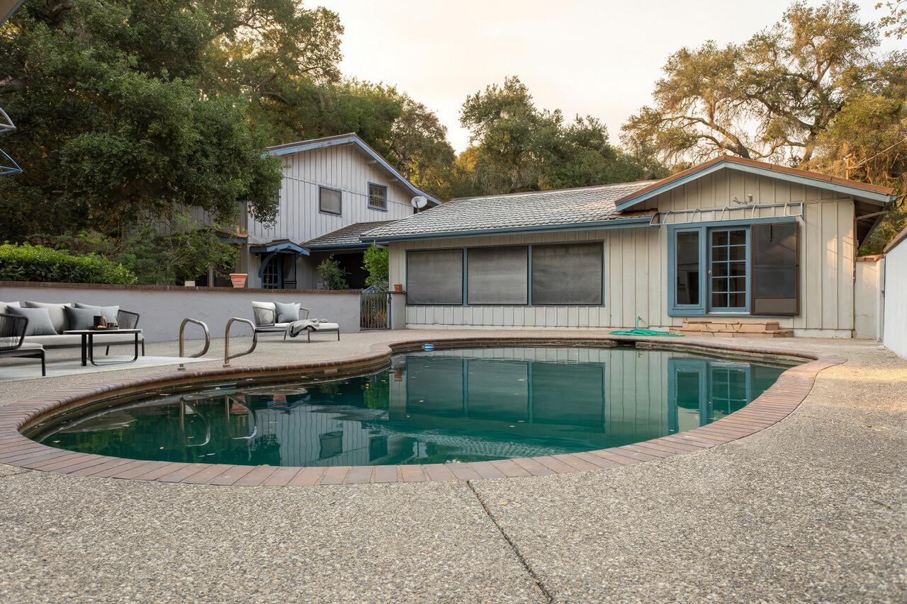 4260 Oak View Road Santa Ynez, CA 93460 - Photo 53 of 98 a front view of a house with swimming pool