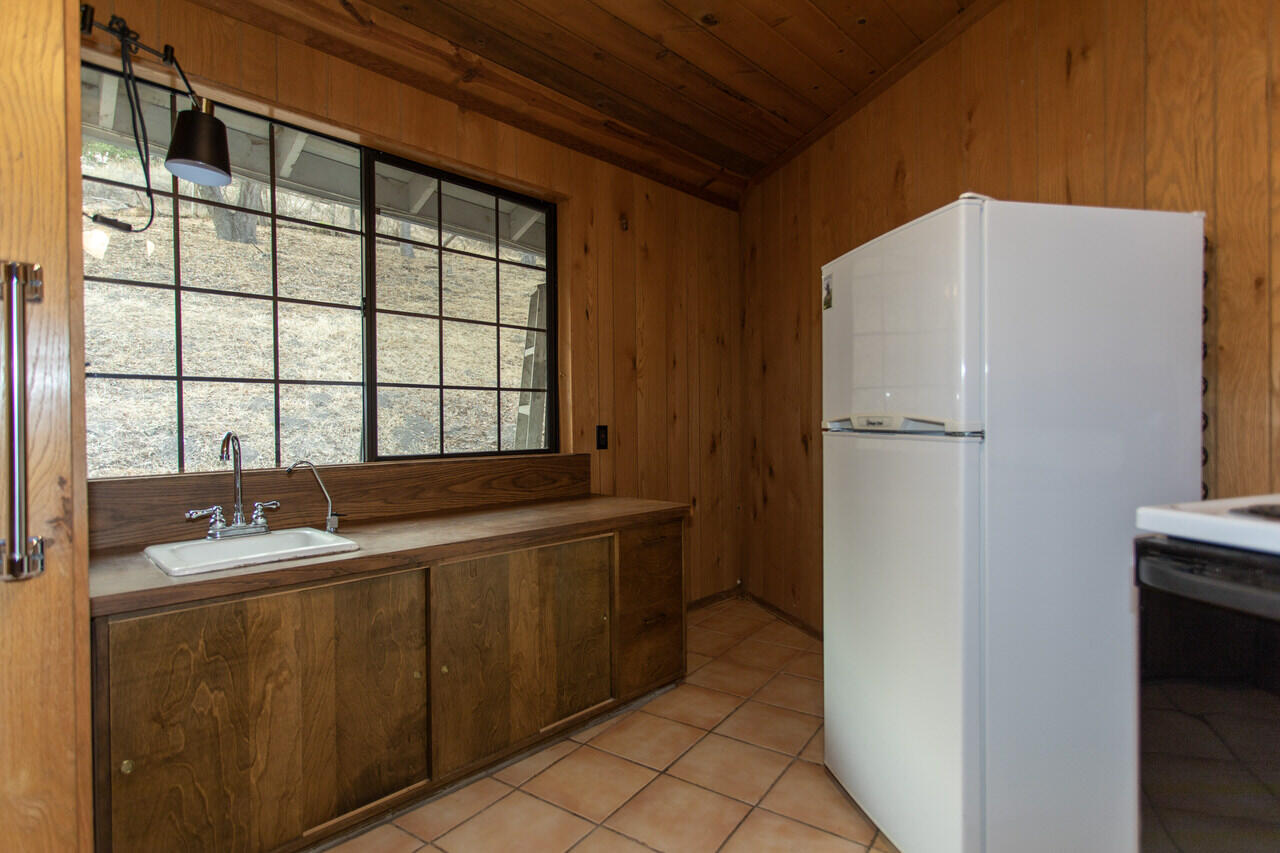 4260 Oak View Road Santa Ynez, CA 93460 - Photo 78 of 98 a bathroom with a granite countertop sink and a bathtub