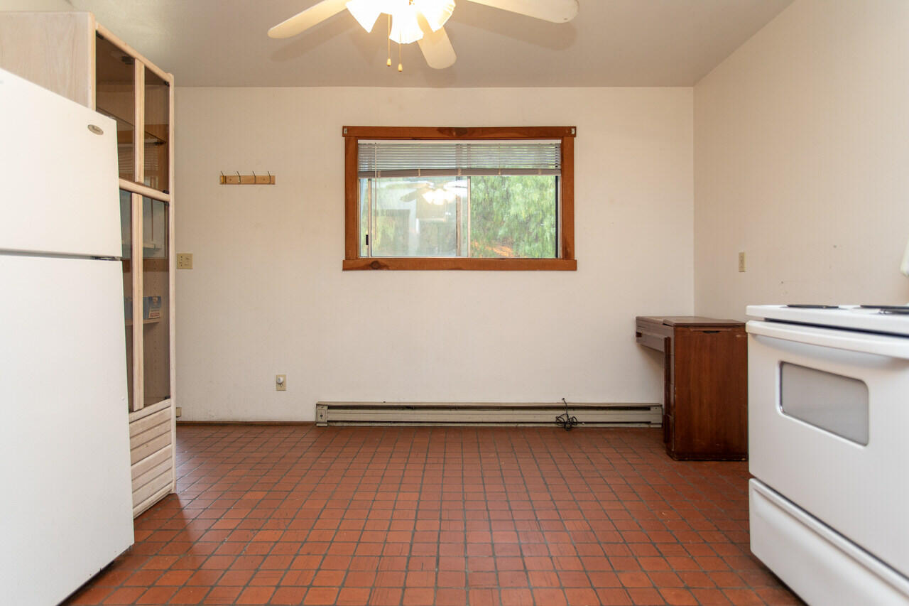 4260 Oak View Road Santa Ynez, CA 93460 - Photo 91 of 98 a view of a room with wooden floor and a ceiling fan