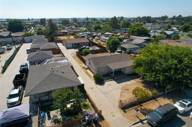 an aerial view of a house with a garden