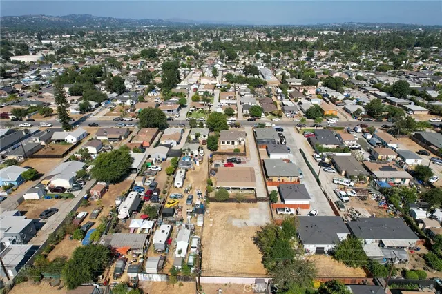 an aerial view of residential building with parking space