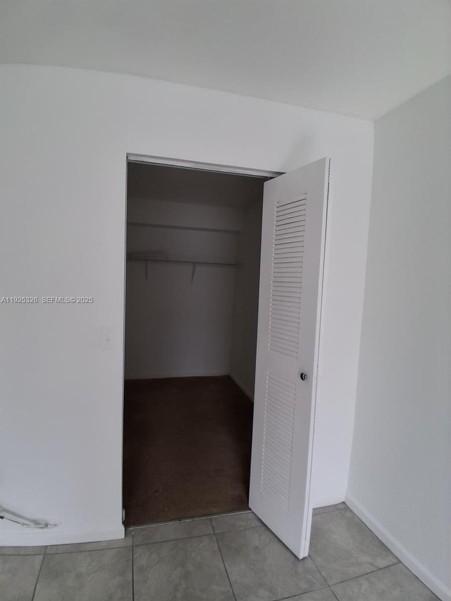 15460 Southwest 284th Street, Unit 4307 Homestead, FL 33033 - Photo 13 of 13 a view of walk in closet
