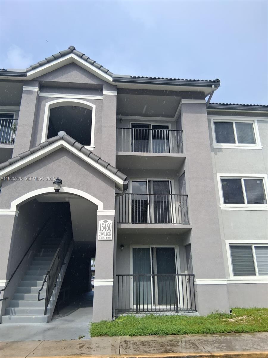 15460 Southwest 284th Street, Unit 4307 Homestead, FL 33033 - Photo 2 of 13 a front view of a house