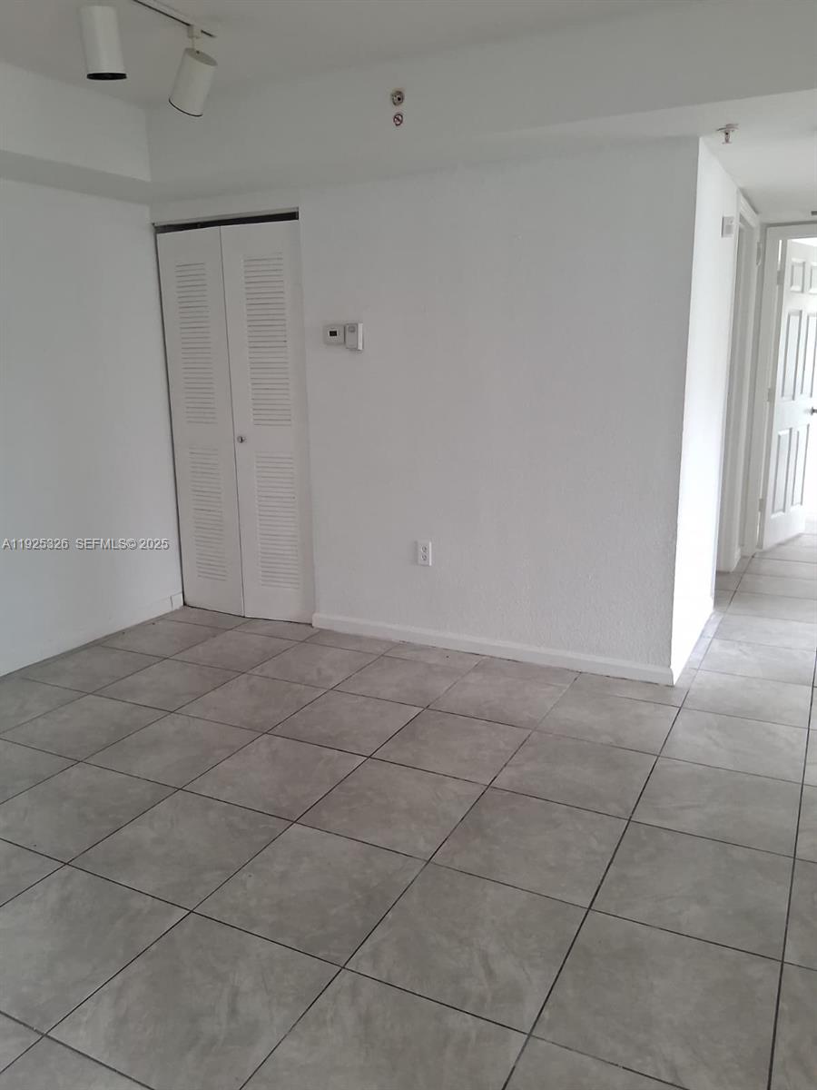 15460 Southwest 284th Street, Unit 4307 Homestead, FL 33033 - Photo 6 of 13 a view of an empty room