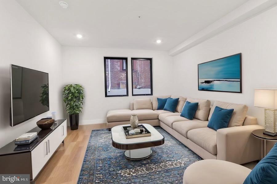 2007 Cambridge Street Philadelphia, PA 19130 - Photo 18 of 33 a living room with furniture and a flat screen tv