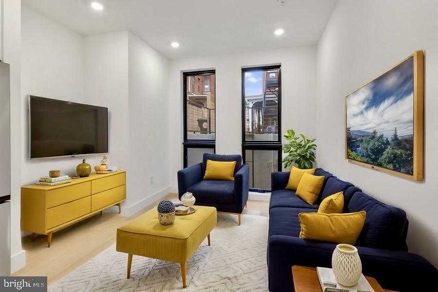 2007 Cambridge Street Philadelphia, PA 19130 - Photo 19 of 33 a living room with furniture and a flat screen tv