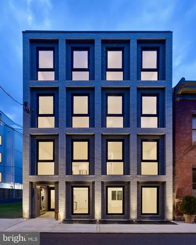 a red brick building with windows