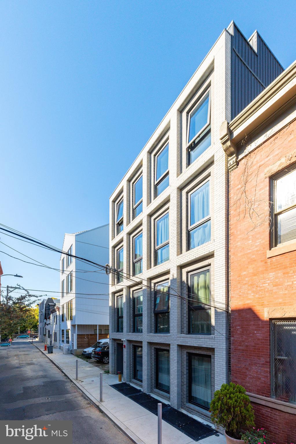 2007 Cambridge Street Philadelphia, PA 19130 - Photo 9 of 33 a front view of a building with street