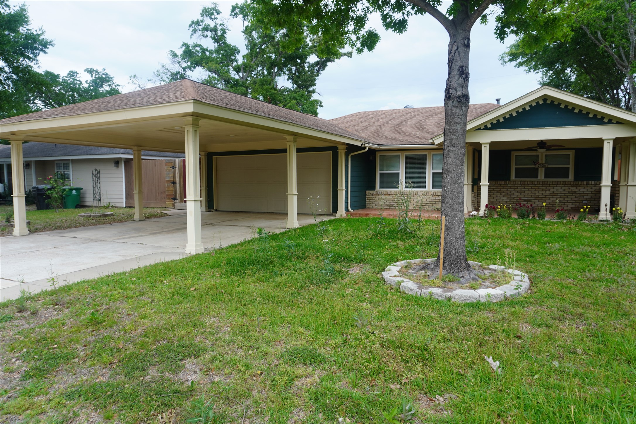 7506 Dearborn Street Houston, TX 77055 - Photo 1 of 15 a front view of a house with a yard
