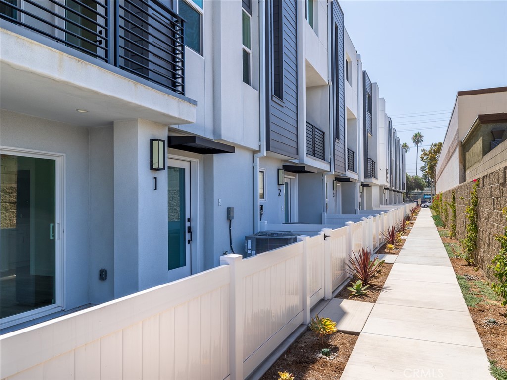 121 East 223rd Street, Unit 3 Carson, CA 90745 - Photo 25 of 34 a view of a building with stairs
