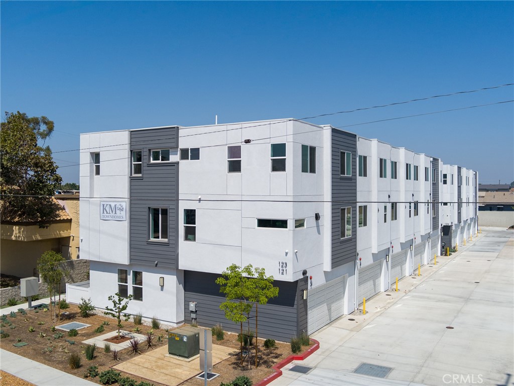 121 East 223rd Street, Unit 3 Carson, CA 90745 - Photo 31 of 34 a large building with a street