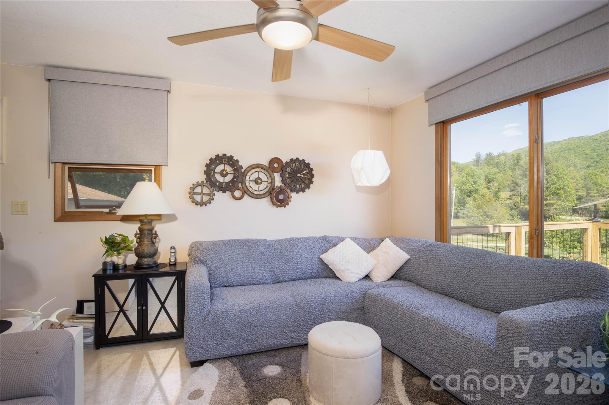 93 Franklin Crest Road Spruce Pine, NC 28777 - Photo 34 of 47 a living room with furniture and a large window