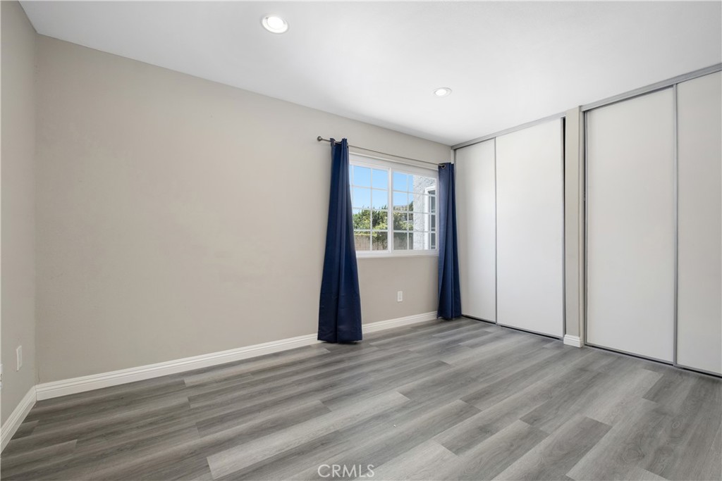 7 Hancock Irvine, CA 92620 - Photo 16 of 46 a view of an empty room with wooden floor