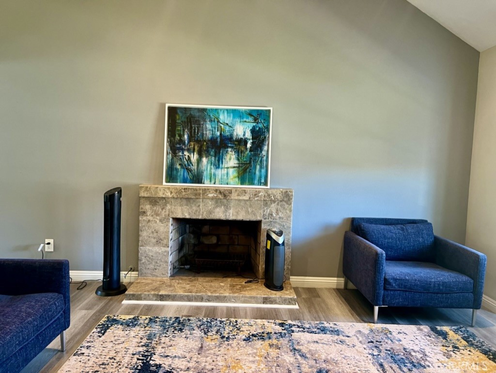 7 Hancock Irvine, CA 92620 - Photo 34 of 46 a living room with furniture and a fireplace