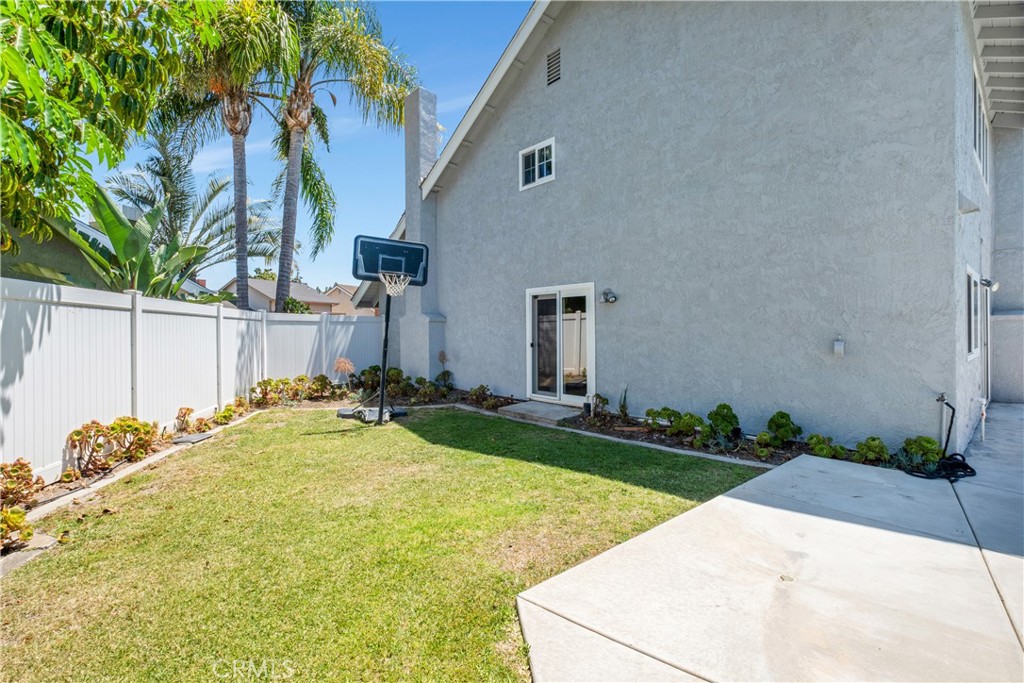 7 Hancock Irvine, CA 92620 - Photo 41 of 46 a view of a backyard with table and chairs and potted plants