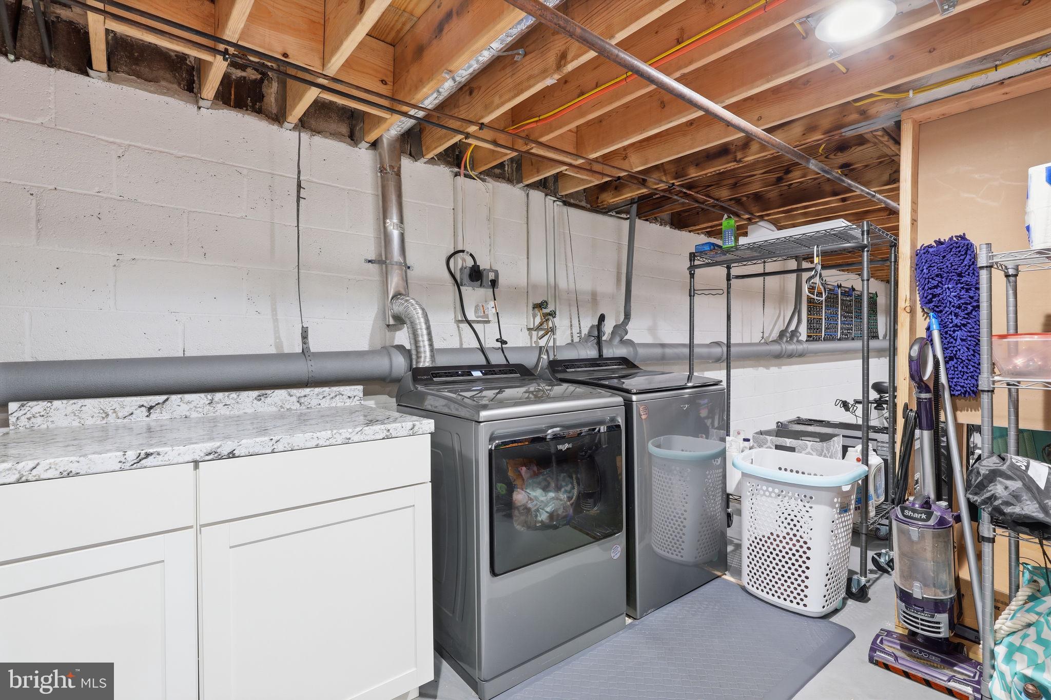 22 Fitzwatertown Road, Unit C7 Willow Grove, PA 19090 - Photo 26 of 33 Modern laundry space with ample storage.