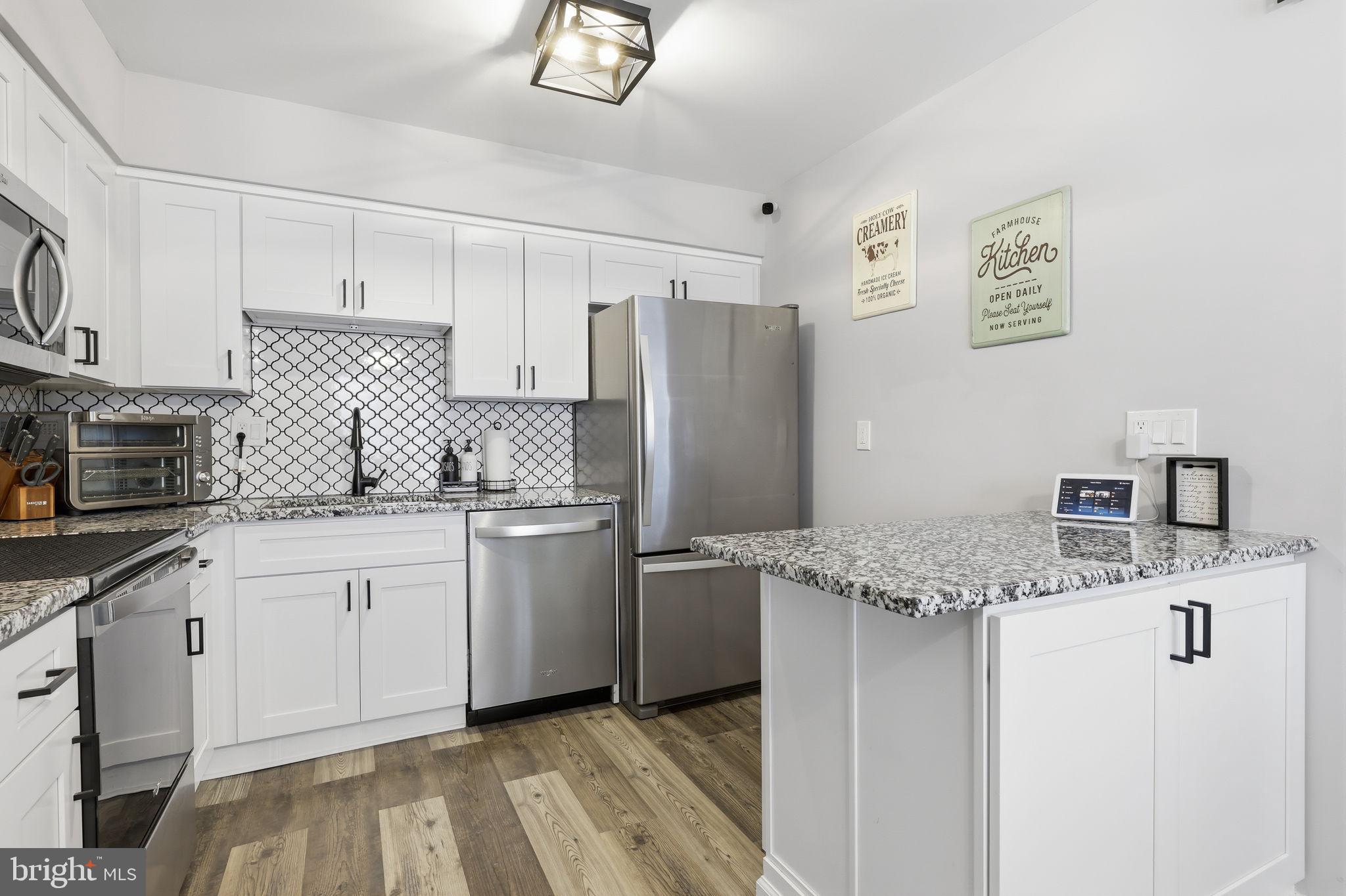 22 Fitzwatertown Road, Unit C7 Willow Grove, PA 19090 - Photo 3 of 33 Modern kitchen with sleek finishes.