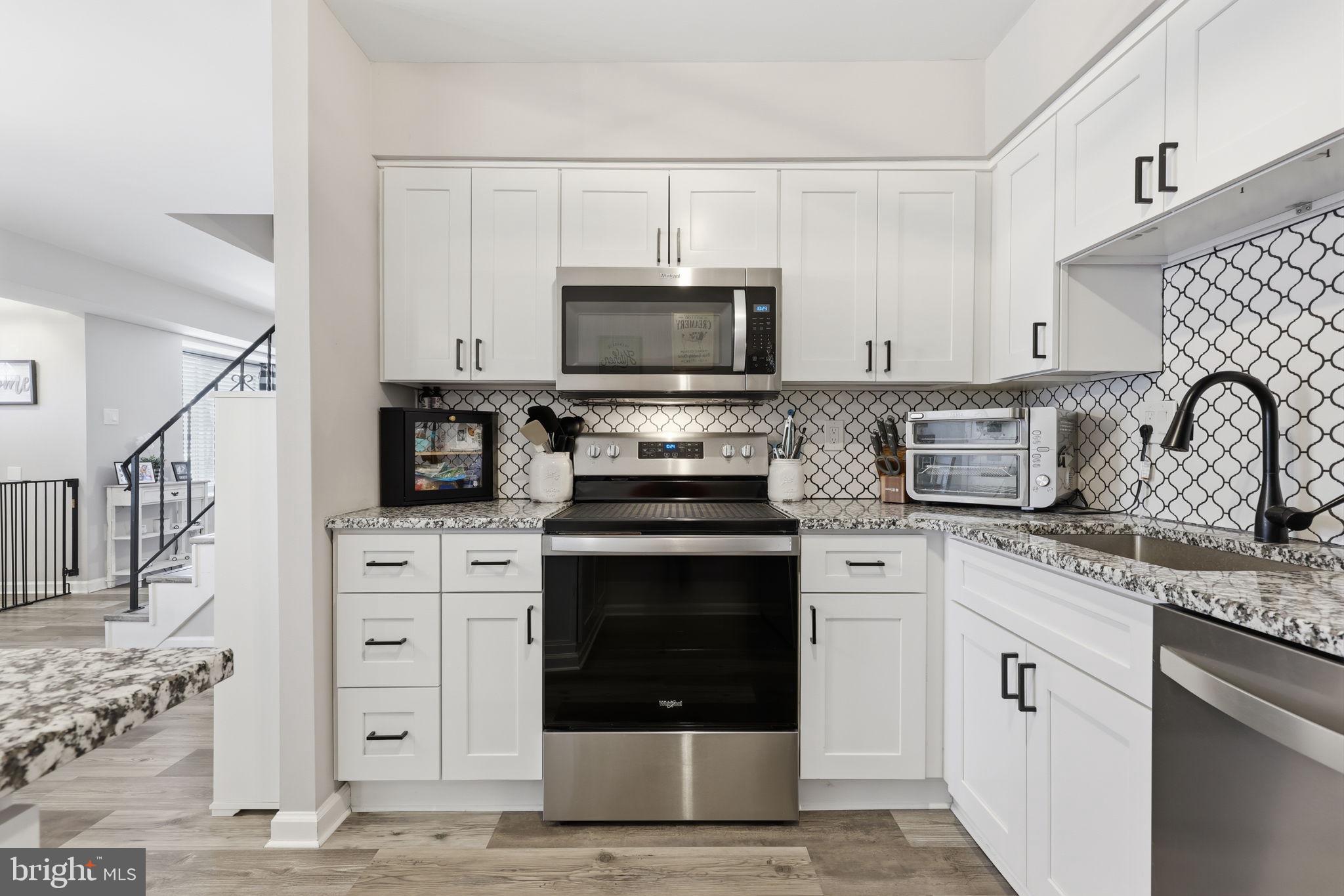 22 Fitzwatertown Road, Unit C7 Willow Grove, PA 19090 - Photo 9 of 33 Modern kitchen with sleek finishes.