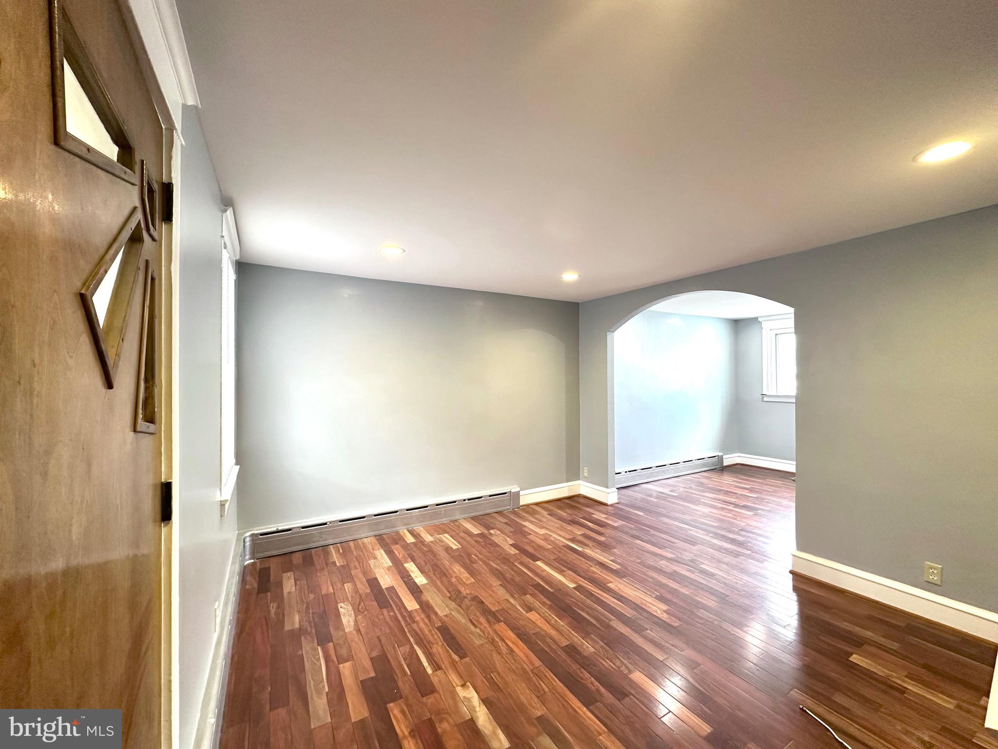 613 Copley Road Upper Darby, PA 19082 - Photo 1 of 16 a view of an empty room and window