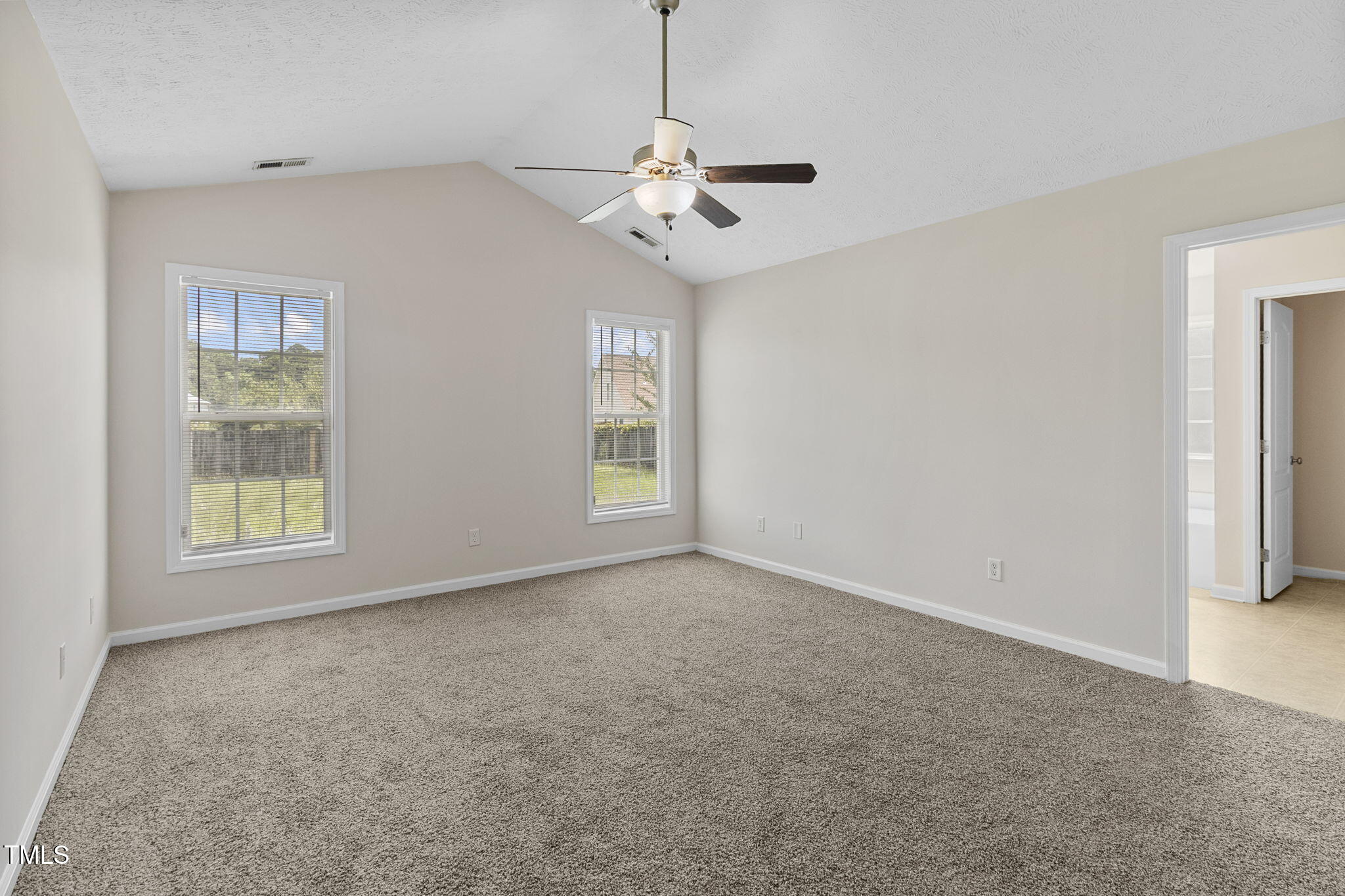2513 Hunting Bow Drive Hope Mills, NC 28348 - Photo 18 of 39 an empty room with windows and fan