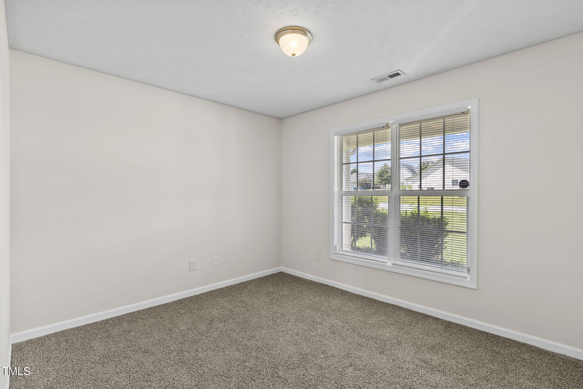 2513 Hunting Bow Drive Hope Mills, NC 28348 - Photo 32 of 39 an empty room with a window