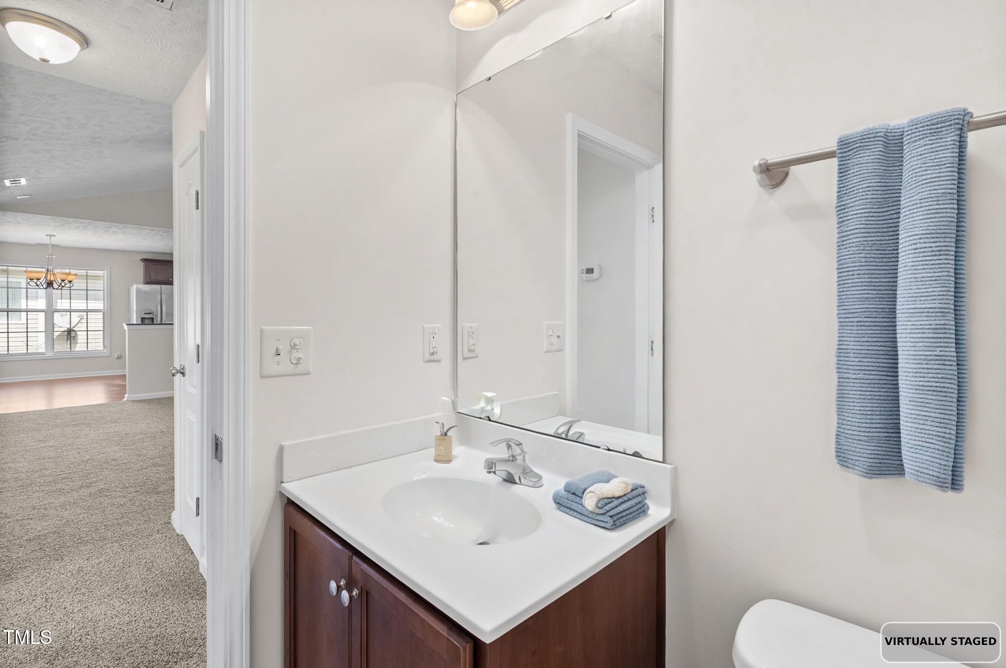 2513 Hunting Bow Drive Hope Mills, NC 28348 - Photo 35 of 39 a bathroom with a sink and a toilet