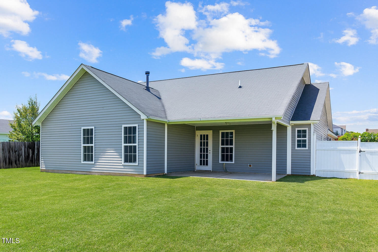 2513 Hunting Bow Drive Hope Mills, NC 28348 - Photo 37 of 39 a view of a house with backyard and porch