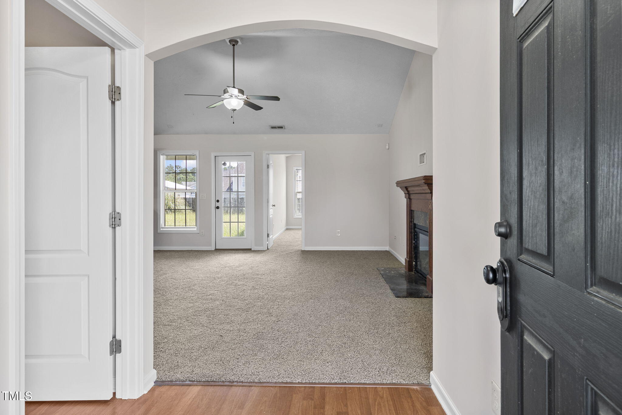 2513 Hunting Bow Drive Hope Mills, NC 28348 - Photo 3 of 39 a view of a hallway with chandelier and entryway