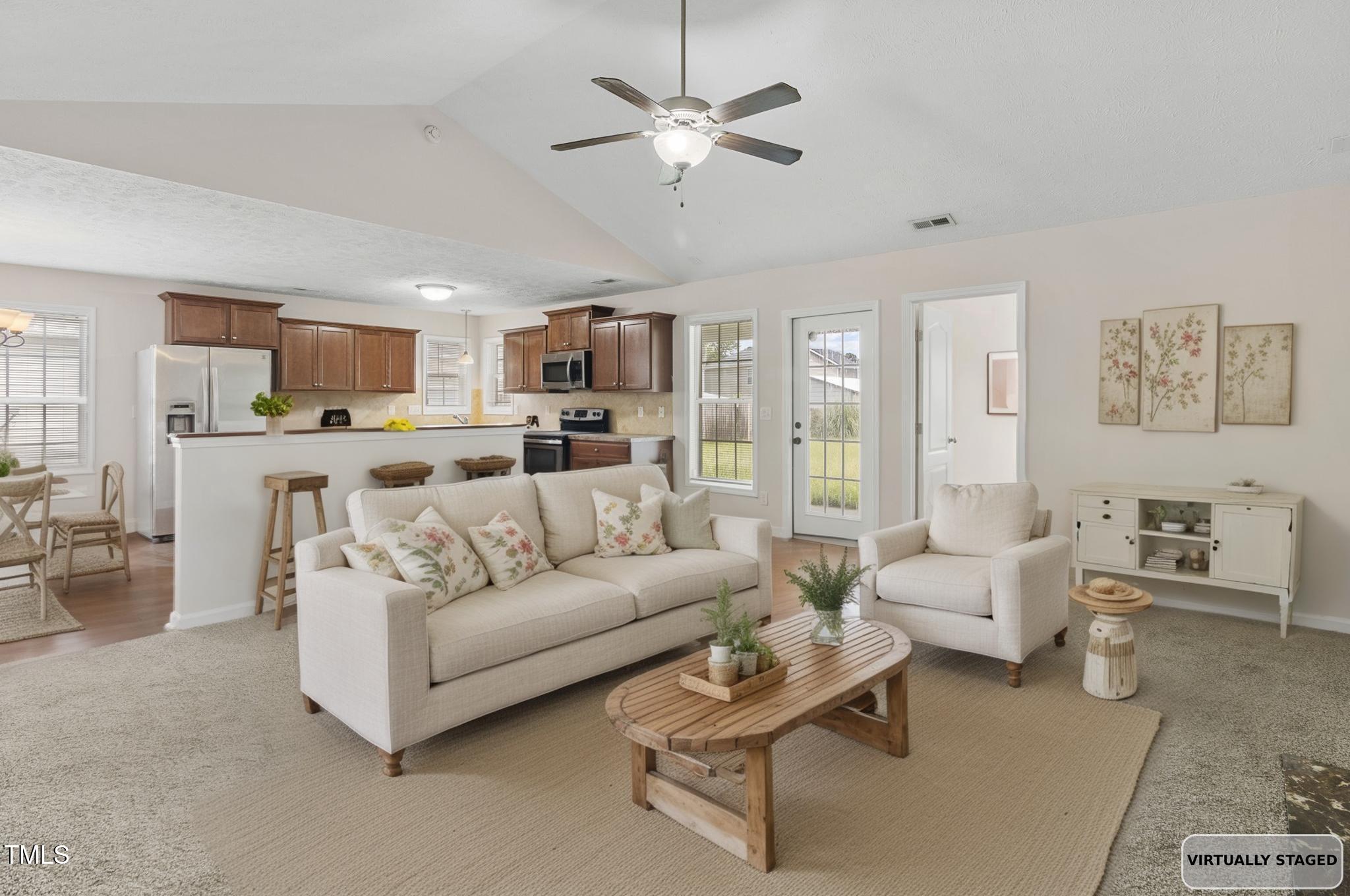 2513 Hunting Bow Drive Hope Mills, NC 28348 - Photo 6 of 39 a living room with furniture and kitchen view