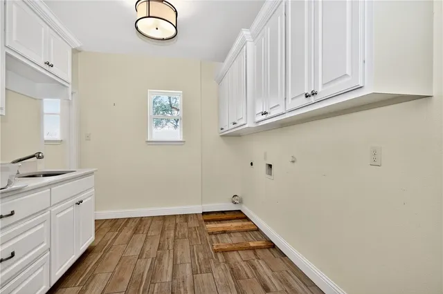 a view of cabinets and wooden floor